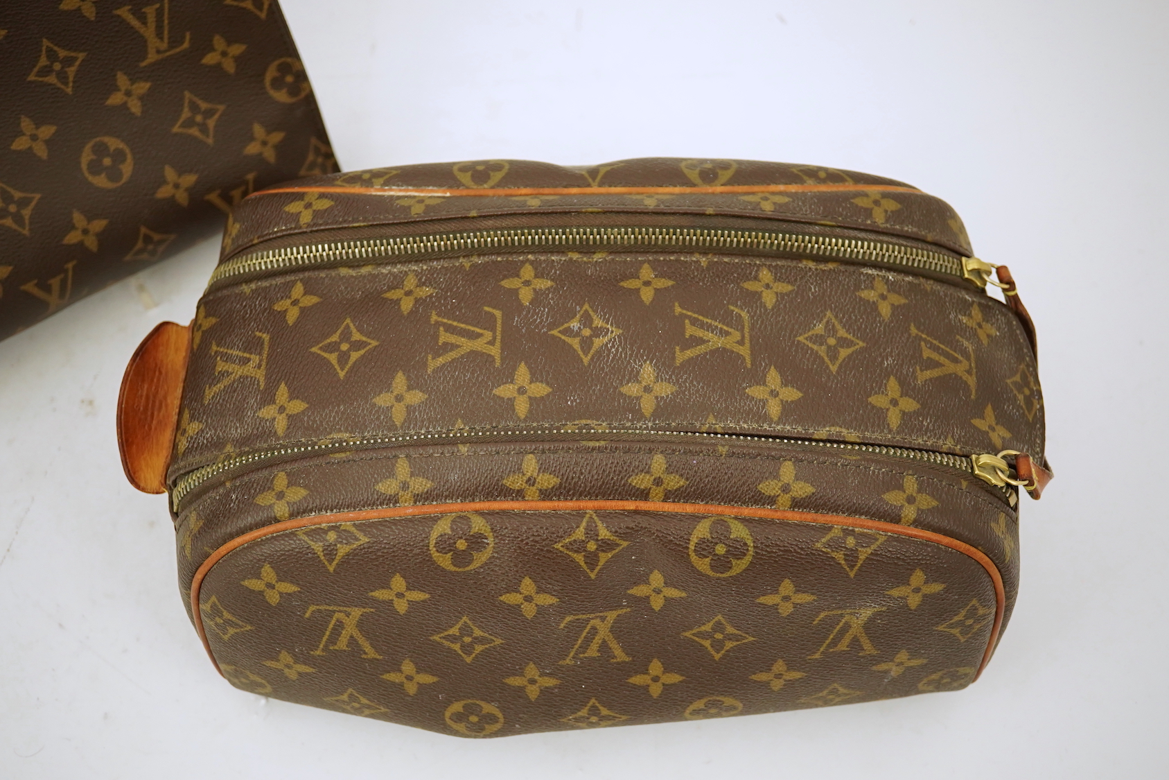 Two Louis Vuitton wash bags